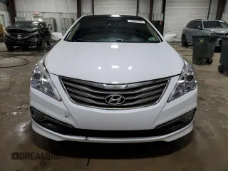 2015 Hyundai Azera Limited z VIN KMHFH4JG1FA448378, wystawiony jako Copart lot #76099764 z przebiegiem 117 489 mil mil oraz Szkoda całkowita • Salvage title. Historia ofert i sprzedaży dostępna na DreamBid. Obrazek 5.