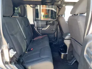 2014 Jeep Wrangler Unlimited Sport with VIN 1C4BJWDG2EL294829, listed as a Copart auction lot 51921685 with 138,203 mi miles and Salvage Title. Bid and sale history available at DreamBid. Image 11.