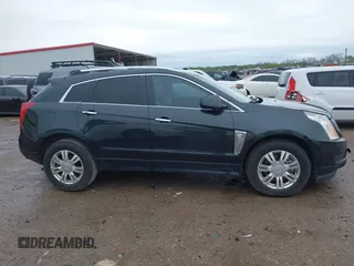 2014 Cadillac SRX Luxury Collection with VIN 3GYFNBE31ES591962, listed as a IAAI auction lot 41948735 with 97,523 mi miles and . Bid and sale history available at carsss.com. Image 13.