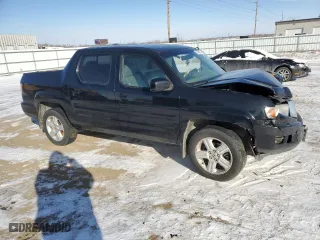 2011 Honda Ridgeline RTL with VIN 5FPYK1F55BB454780, listed as a Copart auction lot 37706554 with 0 mi miles and Salvage Title. Bid and sale history available at carsss.com. Image 4.