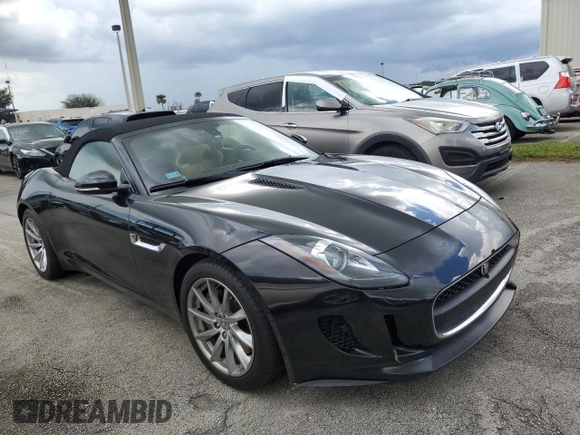 2014 Jaguar F-Type V6 with VIN SAJWA6E73E8K05239, listed as a Copart auction lot 74325574 with 53,882 mi miles and Non Repairable. Bid and sale history available at DreamBid. Image 4.