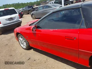 2002 Chevrolet Camaro Z28 z VIN 2G1FP22G222101109, wystawiony jako IAAI lot #39531558 z przebiegiem 100 136 mil mil oraz . Historia ofert i sprzedaży dostępna na DreamBid. Obrazek 15.