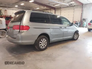 2010 Honda Odyssey EX-L with VIN 5FNRL3H66AB056827, listed as a IAAI auction lot 41891595 with 162,229 mi miles. Bid and sale history available at carsss.com. Image 4.