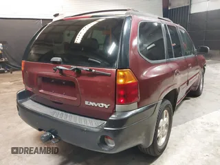2002 GMC Envoy SLT with VIN 1GKDT13SX22426320, listed as a IAAI auction lot 41709359 with 104,418 mi miles. Bid and sale history available at carsss.com. Image 4.