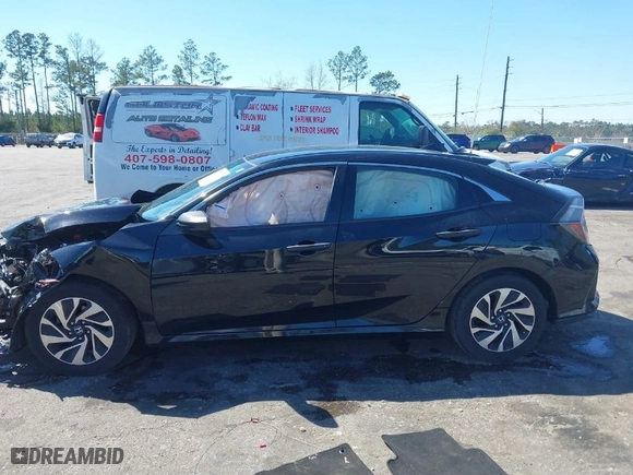 2018 Honda Civic Hatchback LX with VIN SHHFK7H20JU201840, listed as a IAAI auction lot 41775448 with 57,702 mi miles. Bid and sale history available at carsss.com. Image 14.