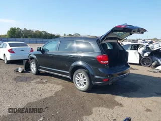 2013 Dodge Journey SXT with VIN 3C4PDCBG7DT710844, listed as a IAAI auction lot 40582910 with 136,741 mi miles and . Bid and sale history available at DreamBid. Image 3.