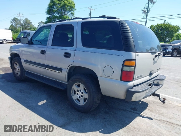 2004 Chevrolet Tahoe LS z VIN 1GNEC13V04J244023, wystawiony jako IAAI lot #42135613 z przebiegiem 298 581 mil mil oraz . Historia ofert i sprzedaży dostępna na DreamBid. Obrazek 3.