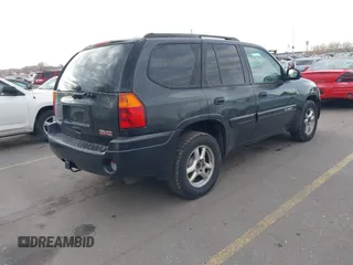 2005 GMC Envoy SLT with VIN 1GKDT13S352258833, listed as a IAAI auction lot 41525149 with 213,829 mi miles. Bid and sale history available at carsss.com. Image 4.
