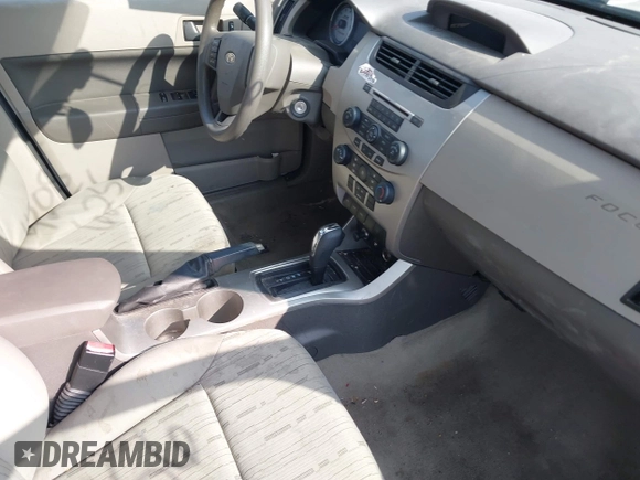 2009 Ford Focus SE z VIN 1FAHP35N79W235743, wystawiony jako IAAI lot #42086256 z przebiegiem 95 986 mil mil oraz . Historia ofert i sprzedaży dostępna na DreamBid. Obrazek 5.