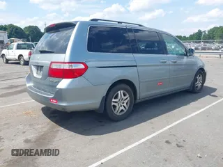 2005 Honda Odyssey EX-L z VIN 5FNRL38765B103871, wystawiony jako IAAI lot #42182984 z przebiegiem 203 555 mil mil oraz . Historia ofert i sprzedaży dostępna na DreamBid. Obrazek 4.