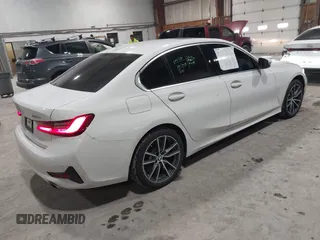 2020 BMW 3 Series 330i xDrive with VIN 3MW5R7J06L8B17690, listed as a IAAI auction lot 41659559 with 74,357 mi miles. Bid and sale history available at carsss.com. Image 4.