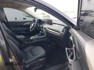 2020 Mazda CX-9 Touring z VIN JM3TCACY5L0412308, wystawiony jako IAAI lot #41208401 z przebiegiem 37 029 mil mil oraz . Historia ofert i sprzedaży dostępna na DreamBid. Obrazek 5.