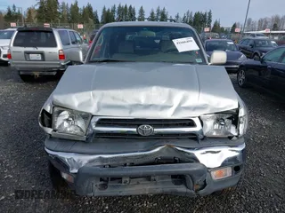 1999 Toyota 4Runner SR5 z VIN JT3HN86R0X0196528, wystawiony jako IAAI lot #41666499 z przebiegiem 294 216 mil mil oraz . Historia ofert i sprzedaży dostępna na DreamBid. Obrazek 12.