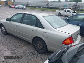 2001 Toyota Avalon XL z VIN 4T1BF28B91U144533, wystawiony jako IAAI lot #42247586 z przebiegiem 207 775 mil mil oraz . Historia ofert i sprzedaży dostępna na DreamBid. Obrazek 3.