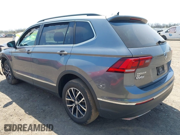 2020 Volkswagen Tiguan SE with VIN 3VV2B7AX4LM074385, listed as a IAAI auction lot 42063842 with 101,092 mi miles and . Bid and sale history available at DreamBid. Image 3.