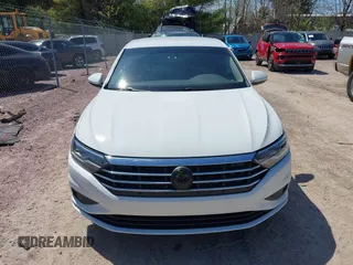 2021 Volkswagen Jetta S z VIN 3VWC57BU6MM045659, wystawiony jako IAAI lot #42201090 z przebiegiem 66 937 mil mil oraz . Historia ofert i sprzedaży dostępna na DreamBid. Obrazek 13.