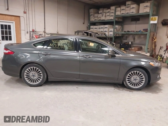 2016 Ford Fusion Titanium with VIN 3FA6P0K92GR370044, listed as a IAAI auction lot 42200799 with 95,574 mi miles and . Bid and sale history available at carsss.com. Image 14.