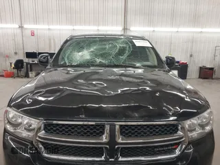 2013 Dodge Durango SXT with VIN 1C4RDJAG0DC512293, listed as a IAAI auction lot 41875919 with 191,128 mi miles and . Bid and sale history available at DreamBid. Image 6.