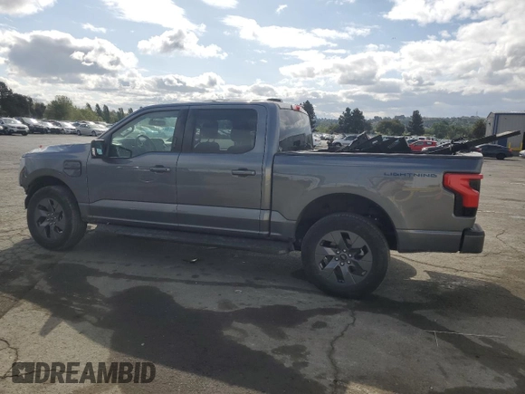 2023 Ford F-150 Lightning Pro with VIN 1FT6W1EV0PWG34788, listed as a Copart auction lot 54454805 with 11,432 mi miles and Salvage title. Bid and sale history available at DreamBid. Image 2.