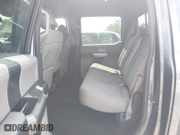 2018 Ford F-150 XL with VIN 1FTEW1E57JFA95086, listed as a IAAI auction lot 42574704 with 77,301 mi miles and . Bid and sale history available at DreamBid. Image 8.