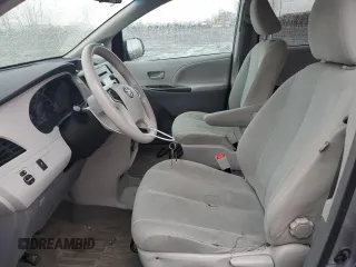 2012 Toyota Sienna with VIN 5TDZK3DC1CS213175, listed as a Copart auction lot 55475615 with 216,082 mi miles and Salvage title. Bid and sale history available at DreamBid. Image 7.