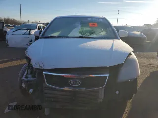 2010 Kia Rio LX with VIN KNADH4A35A6691869, listed as a Copart auction lot 42025785 with 126,381 mi miles and Salvage Title. Bid and sale history available at carsss.com. Image 5.