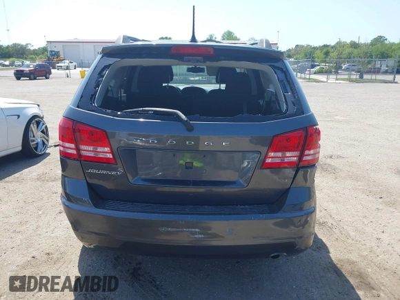 2017 Dodge Journey SE with VIN 3C4PDCAB2HT579852, listed as a IAAI auction lot 42008261 with 112,234 mi miles and . Bid and sale history available at DreamBid. Image 16.