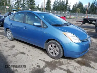 2007 Toyota Prius z VIN JTDKB20U177651351, wystawiony jako IAAI lot #41977711 z przebiegiem 106 925 mil mil oraz . Historia ofert i sprzedaży dostępna na DreamBid. Obrazek 1.