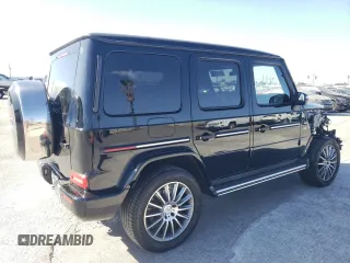 2023 Mercedes-Benz G 550 with VIN W1NYC6BJ3PX461528, listed as a Copart auction lot 87510075 with 19,992 mi miles and Salvage Title. Bid and sale history available at DreamBid. Image 3.