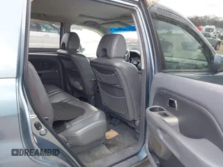 2006 Honda Pilot EX-L with VIN 2HKYF18566H517113, listed as a IAAI auction lot 41917755 with 180,398 mi miles and . Bid and sale history available at DreamBid. Image 8.