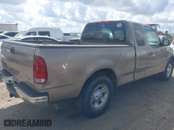 2002 Ford F-150 XL with VIN 1FTRX17222NA12740, listed as a IAAI auction lot 42546970 with 163,344 mi miles and . Bid and sale history available at DreamBid. Image 4.