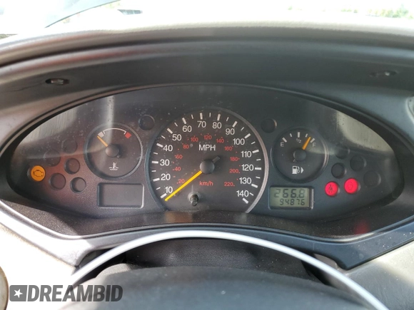 2002 Ford Focus LX with VIN 1FAFP33P72W239485, listed as a Copart auction lot 73323084 with 94,876 mi miles and Non Repairable. Bid and sale history available at DreamBid. Image 9.