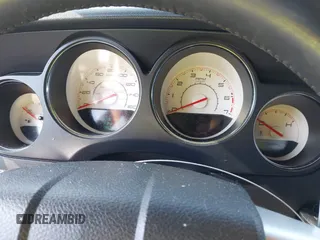 2014 Dodge Challenger R/T z VIN 2C3CDYBT9EH139932, wystawiony jako IAAI lot #42261252 z przebiegiem 95 241 mil mil oraz . Historia ofert i sprzedaży dostępna na DreamBid. Obrazek 7.