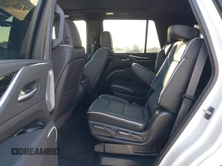 2023 Cadillac Escalade 4WD Sport z VIN 1GYS4FKL7PR286940, wystawiony jako IAAI lot #40702874 z przebiegiem 7 981 mil mil oraz . Historia ofert i sprzedaży dostępna na DreamBid. Obrazek 8.