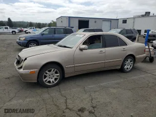 2001 Mercedes-Benz E-Class with VIN WDBJF70J31B293515, listed as a Copart auction lot 53100915 with 0 mi miles and Salvage Title. Bid and sale history available at carsss.com. Image 1.