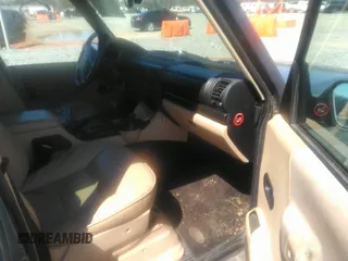 2004 Land Rover Discovery with VIN SALTL19434A859270, listed as a IAAI auction lot 41805997 with 89,308 mi miles and . Bid and sale history available at DreamBid. Image 5.