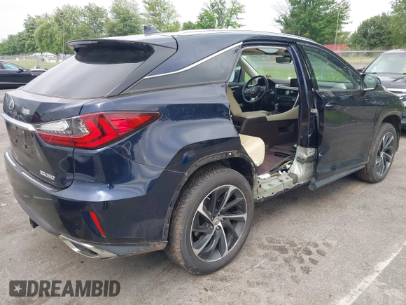 2016 Lexus RX 350 with VIN 2T2BZMCA0GC001767, listed as a IAAI auction lot 42571629 with 84,041 mi miles and . Bid and sale history available at DreamBid. Image 4.