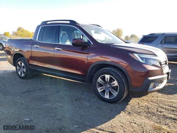 2017 Honda Ridgeline RTL-E with VIN 5FPYK3F78HB027423, listed as a Copart auction lot 77813284 with 199,041 mi miles and Clean Title. Bid and sale history available at carsss.com. Image 4.