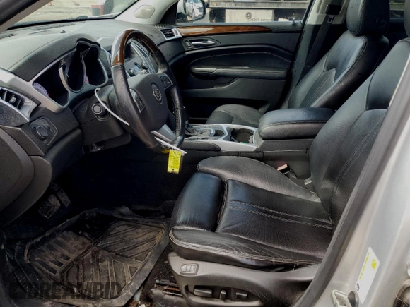 2012 Cadillac SRX Luxury Collection z VIN 3GYFNAE39CS502422, wystawiony jako Copart lot #52488405 z przebiegiem 109 001 mil mil oraz Czysty tytuł • Clean title. Historia ofert i sprzedaży dostępna na DreamBid. Obrazek 7.