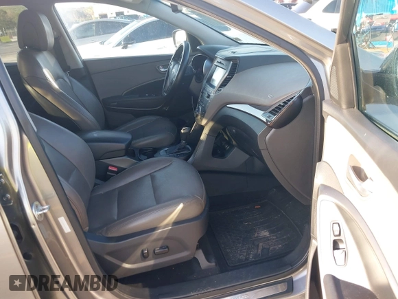 2017 Hyundai Santa Fe 2.4L z VIN 5XYZU3LB0HG420910, wystawiony jako IAAI lot #42017552 z przebiegiem 184 666 mil mil oraz . Historia ofert i sprzedaży dostępna na DreamBid. Obrazek 5.