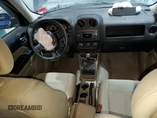 2014 Jeep Patriot Latitude with VIN 1C4NJRFB0ED852882, listed as a Copart auction lot 49674915 with 130,367 mi miles and Salvage title. Bid and sale history available at DreamBid. Image 8.
