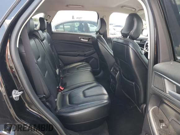 2019 Ford Edge Titanium z VIN 2FMPK3K93KBB54561, wystawiony jako Copart lot #56746065 z przebiegiem 101 792 mil mil oraz Szkoda całkowita • Salvage title. Historia ofert i sprzedaży dostępna na DreamBid. Obrazek 11.