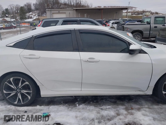 2018 Honda Civic Si with VIN 2HGFC1E50JH706377, listed as a IAAI auction lot 41384413 with 76,115 mi miles and . Bid and sale history available at DreamBid. Image 14.