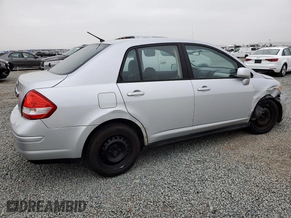 2011 Nissan Versa S with VIN 3N1BC1AP9BL458761, listed as a Copart auction lot 57317115 with 122,606 mi miles and Salvage title. Bid and sale history available at DreamBid. Image 3.