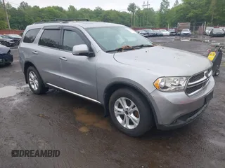 2013 Dodge Durango Crew z VIN 1C4RDJDG1DC696218, wystawiony jako IAAI lot #42323439 z przebiegiem 209 774 mil mil oraz . Historia ofert i sprzedaży dostępna na DreamBid. Obrazek 1.