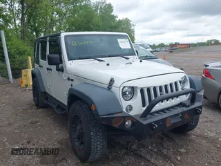 2014 Jeep Wrangler Unlimited Sport with VIN 1C4BJWDG9EL135077, listed as a IAAI auction lot 42324775 with 104,221 mi miles and . Bid and sale history available at DreamBid. Image 1.