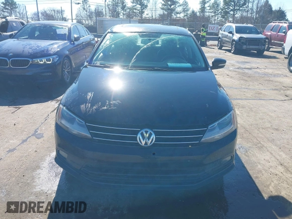2015 Volkswagen Jetta Sedan 1.8T SE w/Connectivity with VIN 3VWD07AJ6FM303403, listed as a IAAI auction lot 41330778 with 150,949 mi miles. Bid and sale history available at carsss.com. Image 12.