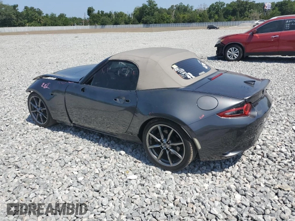2020 Mazda MX-5 Miata Grand Touring z VIN JM1NDAD77L0414873, wystawiony jako Copart lot #54767785 z przebiegiem 47 579 mil mil oraz Szkoda całkowita • Salvage title. Historia ofert i sprzedaży dostępna na DreamBid. Obrazek 2.