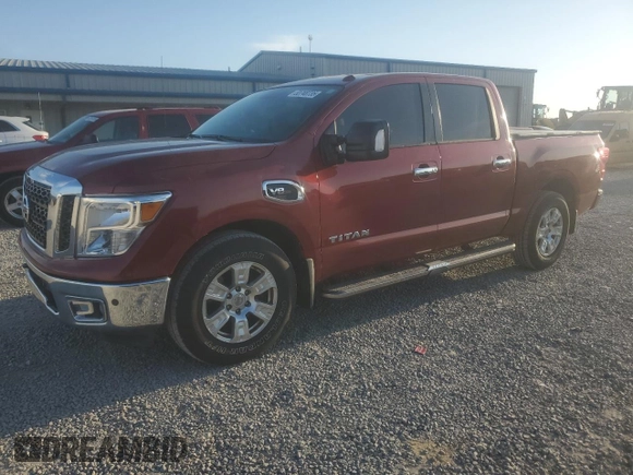 2017 Nissan Titan SV with VIN 1N6AA1E67HN557309, listed as a Copart auction lot 53748735 with 112,197 mi miles and Salvage title. Bid and sale history available at DreamBid. Image 1.