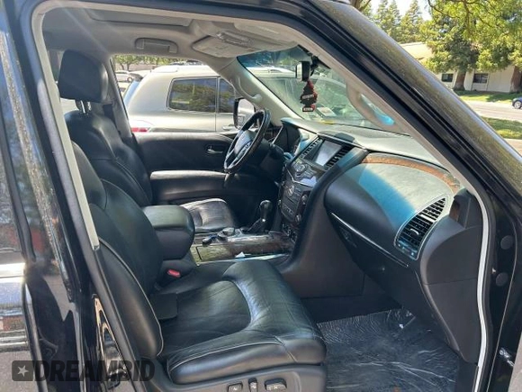 2014 Infiniti QX80 z VIN JN8AZ2NE6E9062908, wystawiony jako Copart lot #61263115 z przebiegiem 155 836 mil mil oraz Czysty tytuł • Clean title. Historia ofert i sprzedaży dostępna na DreamBid. Obrazek 5.